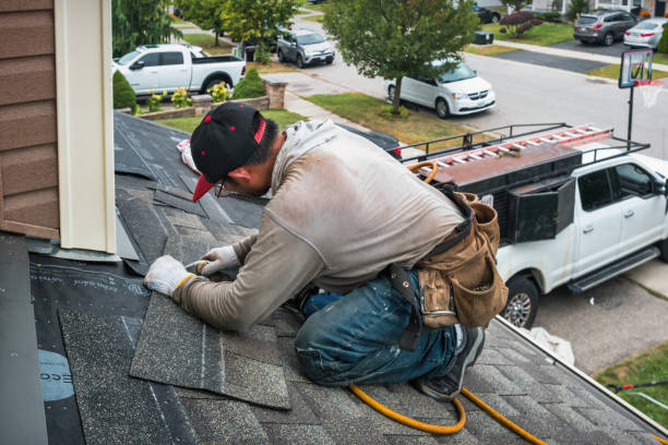 Professional Flat Roof Repair technician working in Babson Park, FL